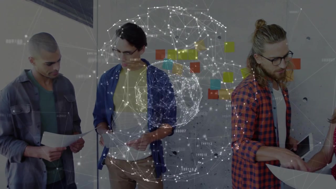 coworkers reviewing printed papers on tablet in tech office, displaying digital network overlay
