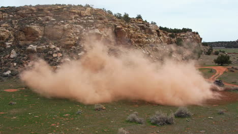Drone Shot of Dust Raising Above ATV Driving Track in Zion National Park, Utah USA