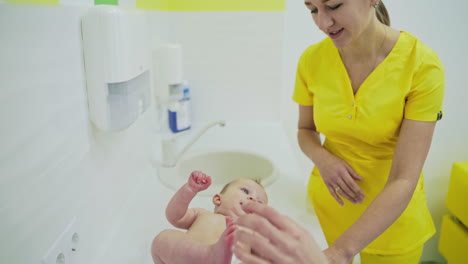 baby visit the doctor. doctor pediatrician and baby patient in clinic