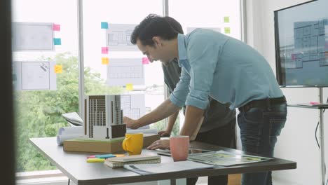 team of creative architects working together in a architect studio