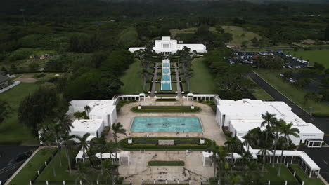 aerial reverse dolly over campus of laie hawaii lds temple, oahu, hawaii