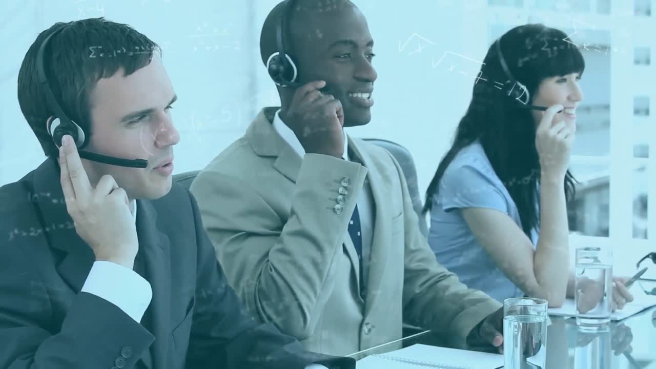 Mathematical equations floating over a multi-ethnic group of call centre workers