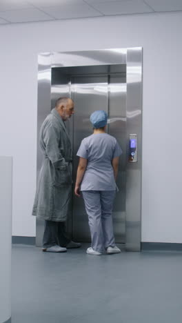 hospital elevator scene with patient and staff