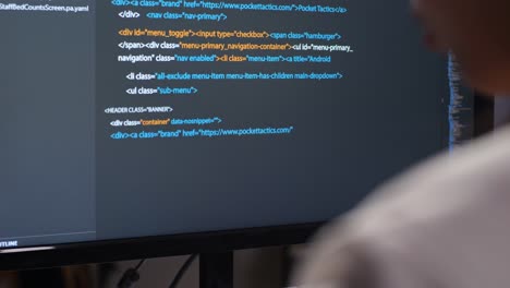 close up of desktop computer's monitor showing script creating software engineer developing app, program, video game at home. terminal with coding language
