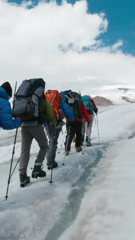 hikers on a glacier