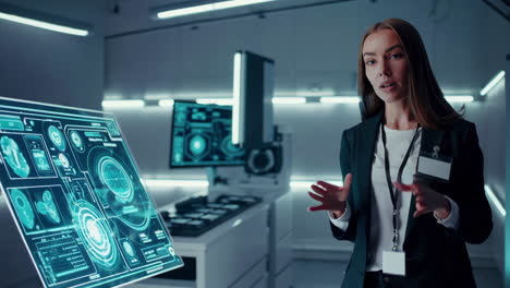a woman presents in a high-tech, futuristic laboratory environment