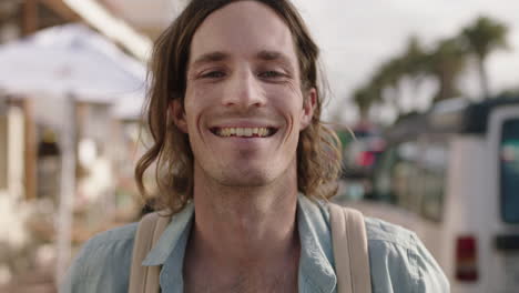 portrait-of-handsome-young-man-smiling-happy-enjoying-relaxed-vacation