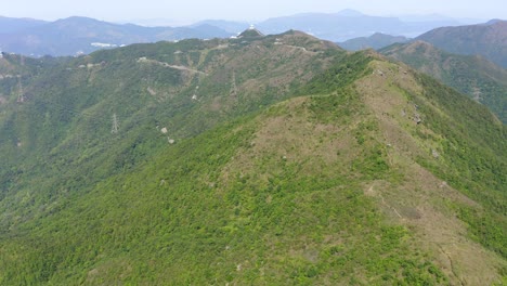 aerial pass over lion rock mountain, hong kong