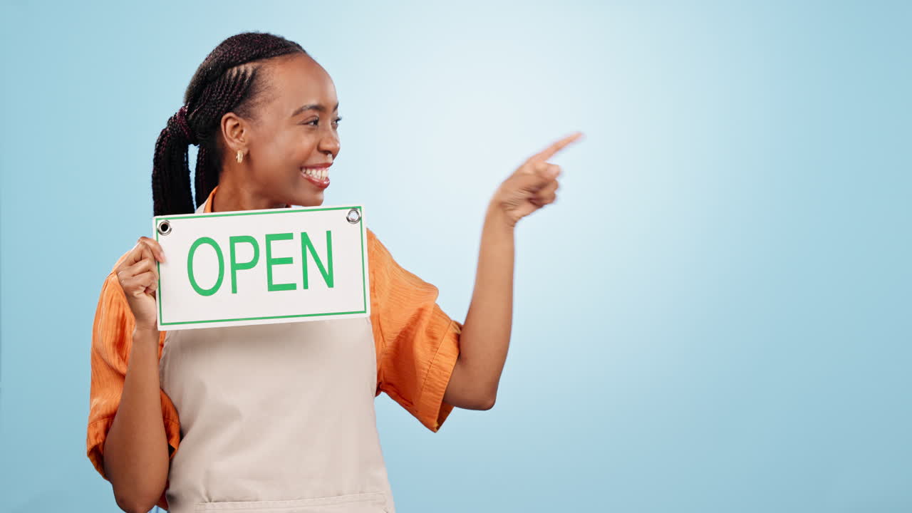 Excited, black woman and sign for mockup pointing