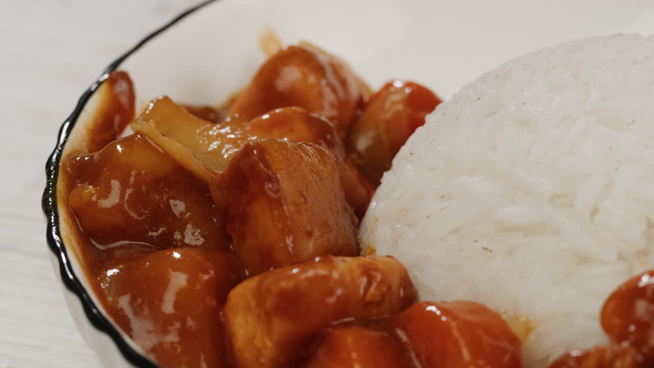 Japanese curry rice with fry pork Tonkatsu, Katsu Kare, Japanese breaded cooking dinner in restaurant, close up macro of asian food