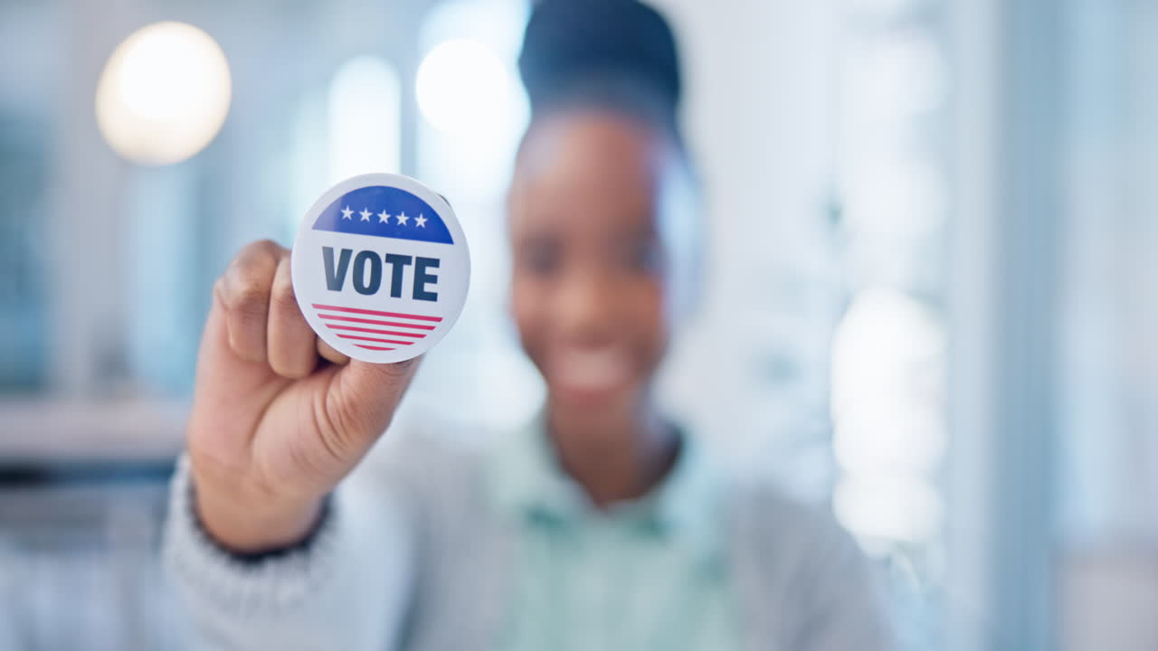 Hand, vote and badge with a black woman