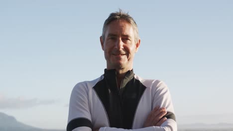 portrait of a man standing on the coast