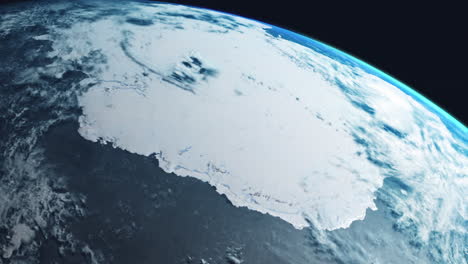 antarctica from space showing entire continent frozen ice shelf with earth slowly rotating with view from orbit with dynamic clouds sea and atmosphere