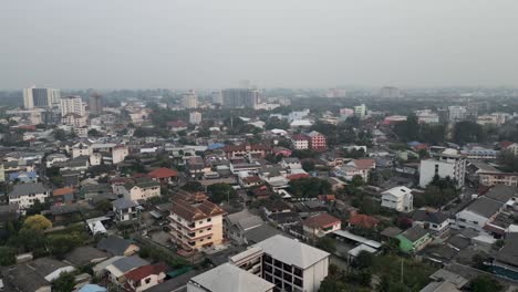 hazy aerial view of a dense urban landscape