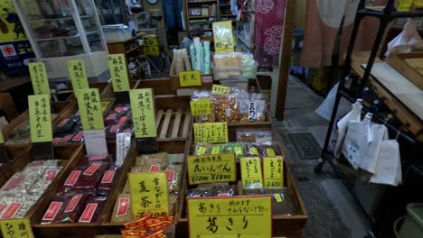 a busy market stall displaying an array of products