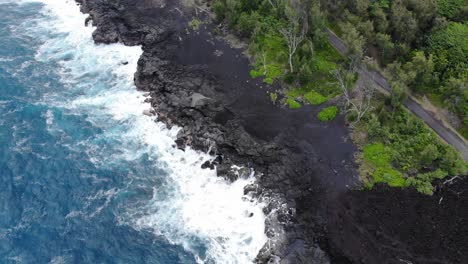 fresh 2018 lava cooled near to road and beach