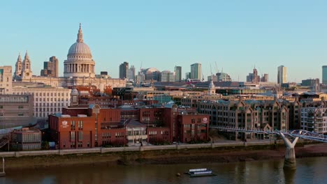 Low-slider-aerial-of-St-Pauls-Cathedral-from-the-Thames-at-sunrise