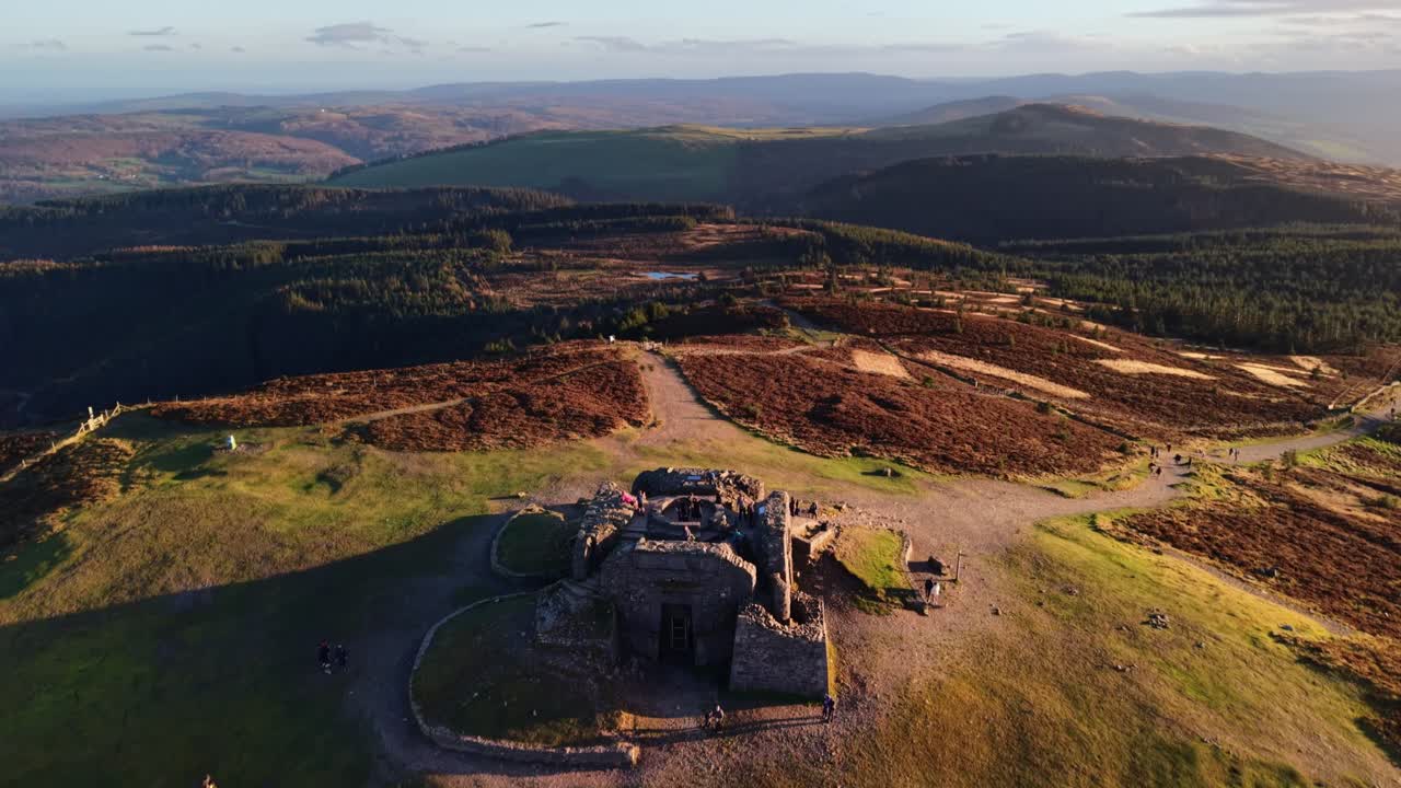 Moel Famau hill fort at sunset in slow motion and stunning HDR , North Wales, UK - move in and over