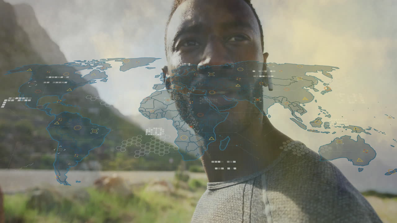 Viewing digital world map with data animation, man standing outdoors
