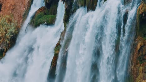 powerful waterfall cascading down rocks