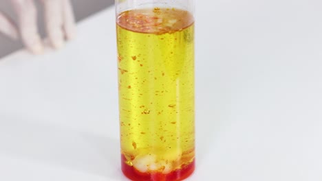 vibrant liquid interaction in a glass cylinder