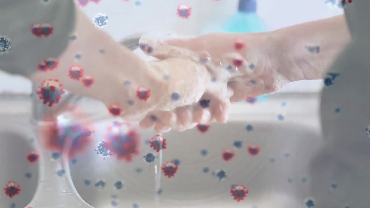 手を洗う人の上をCOVID-19ウイルスがアニメーションする様子