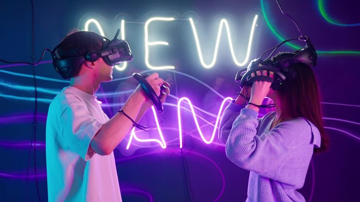 Young Couple Putting on VR Headsets in Neon Lit Room