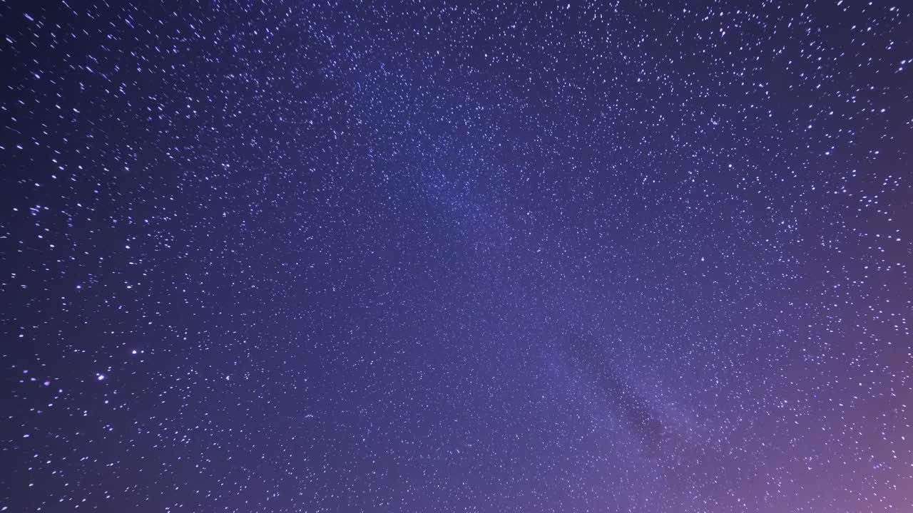 A mesmerizing night sky video with countless stars, captured from a low-angle perspective