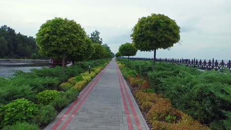 Point-of-view-of-walking-road-near-river.-POV-of-walking-pathway-on-coast-line