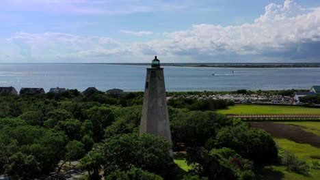 Droning-towards-the-bay-by-the-Old-Baldy-Light-house-in-Bald-Head-Island-North-Carolina