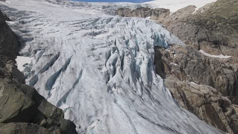 closing up drone footage of glacier in folgefonna national park in norway