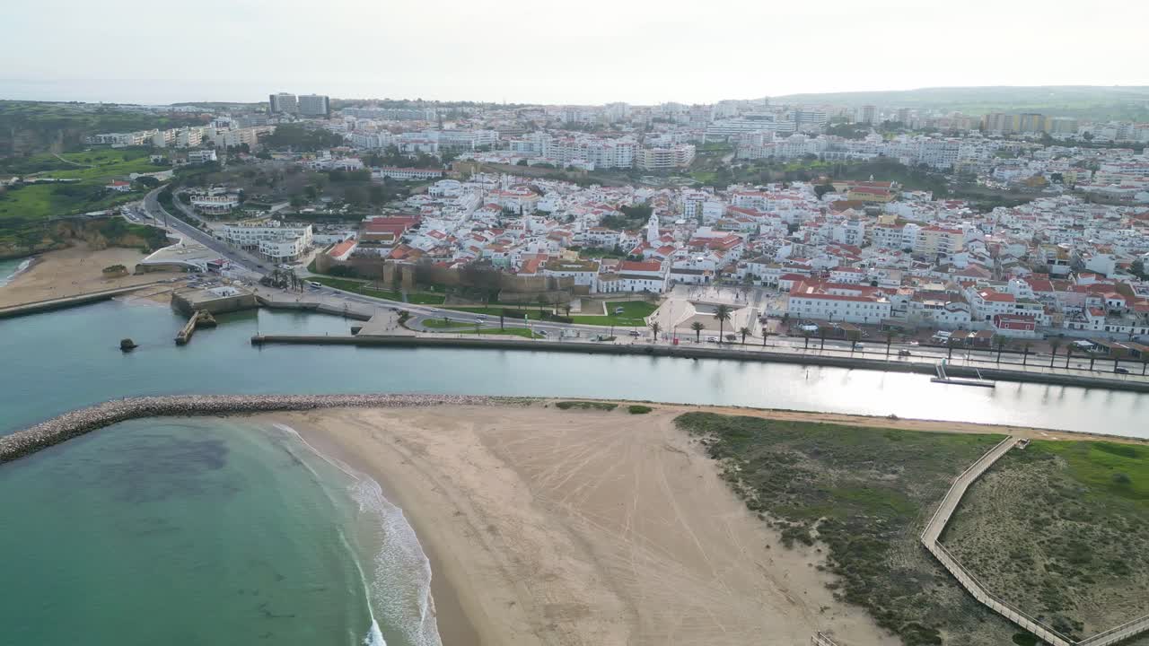Lagos aerial view showcasing Praia de São Roque, sand dunes, and marina area