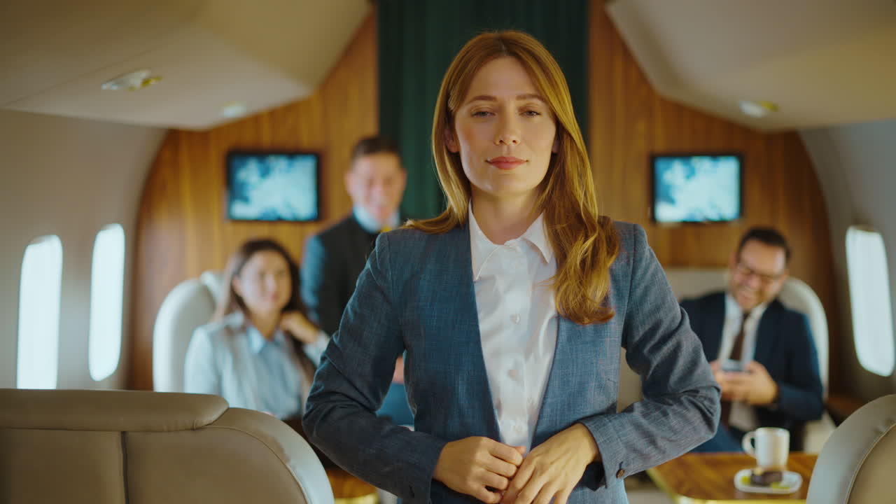 Businesswoman on a Private Jet with Colleagues