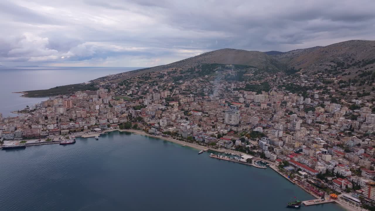 Aerial perspective of Saranda's stunning coastal city and hills