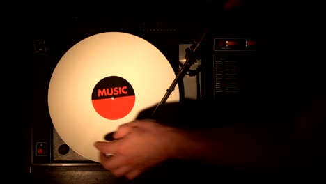 vinyl record on the pleer. plays a song from an old turntable.