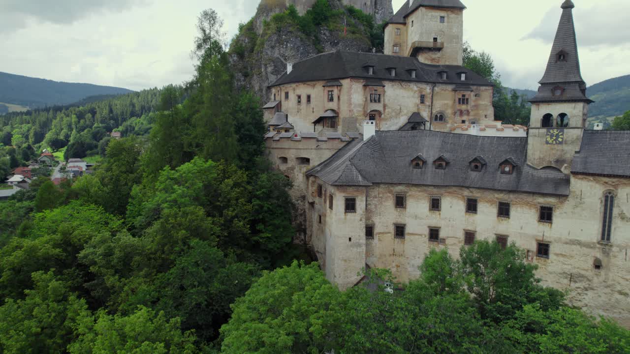 Majestic Castle Nestled in Lush Forest
