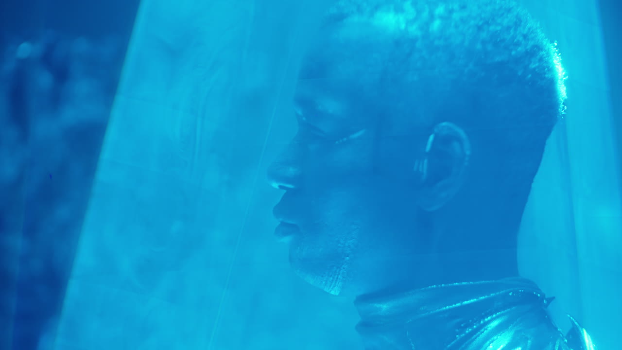 Alien Man in Blue Laser Cone