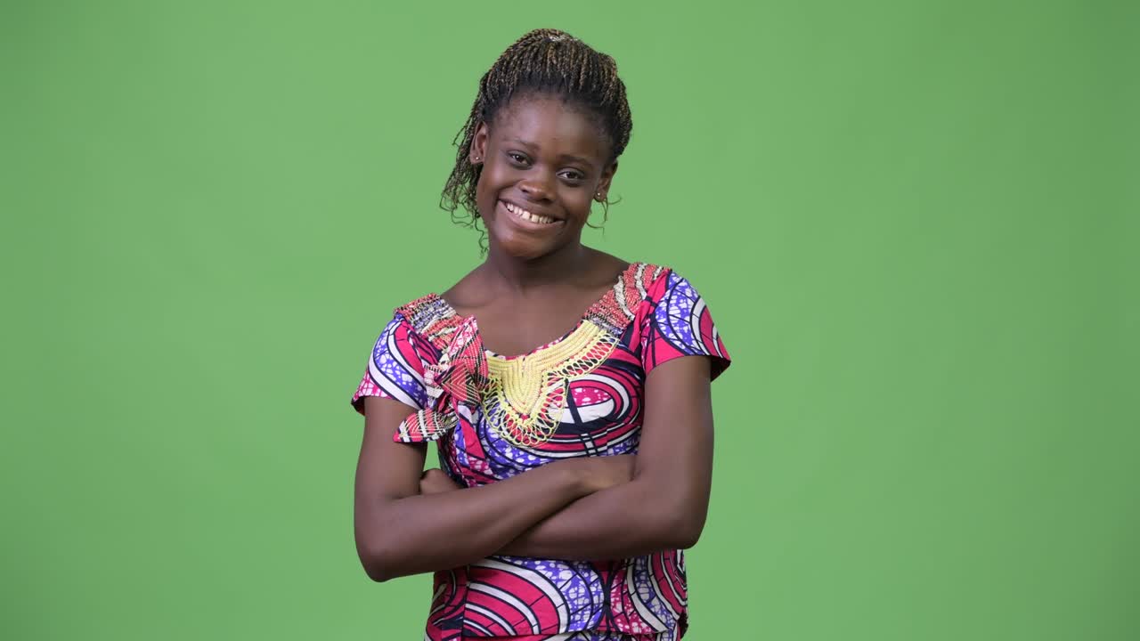 Young African woman with arms crossed