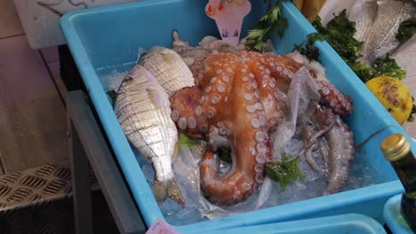 raw uncooked locally caught fresh seafood at fishmongers market naples