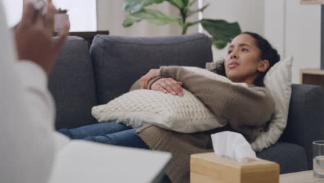 young woman in therapy session lying on a sofa