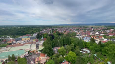 aerial view of a charming town with amusement park