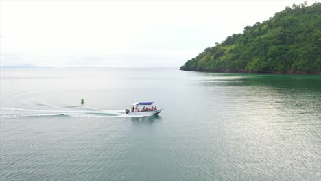 aerial wide shot of a small motor boat off madagascar