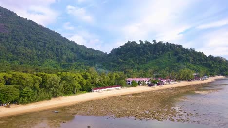 Aerial-shot-of-Kampung-Paya-Beach-Resort-in-Tioman-Island,-Malaysia