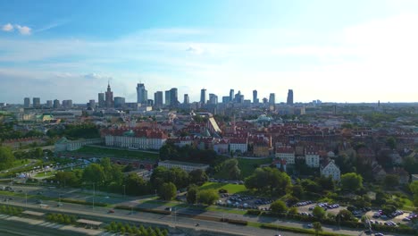 Aerial-panorama-of-Warsaw,-Poland-over-the-Vistual-river-and-City-center-in-a-distance-Old-town