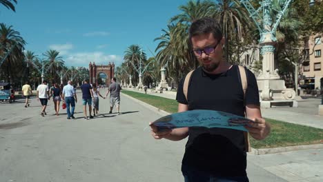 tourist using map in barcelona