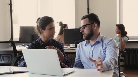 businessman insurance agent consult young indian woman client on workplace