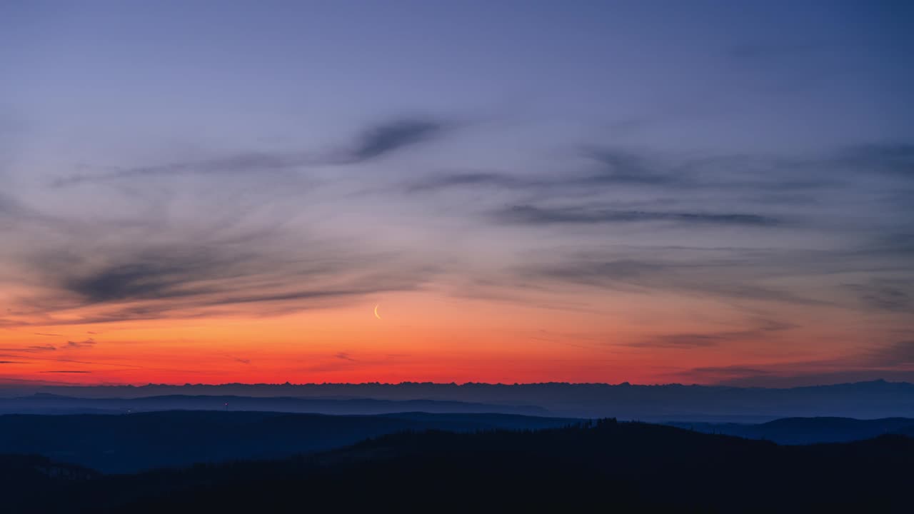 morning time lapse in the black forest with the moon and spectacular colors