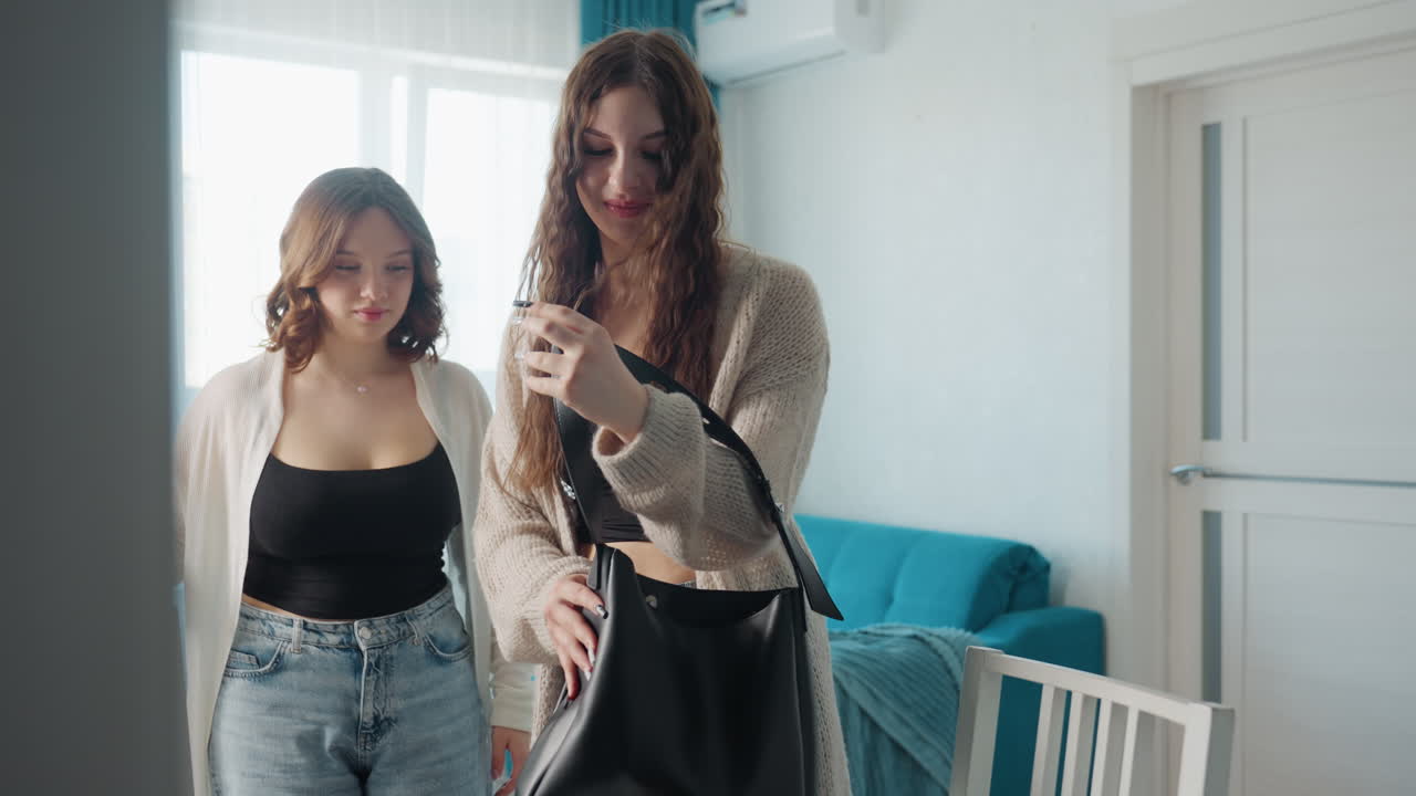 Casual Moments Captured Among Friends Indoors, Casual Group Photo In Vibrant Tealthemed Living Space, Amicable Friends Embrace And Smile While Capturing Selfie In Colorful Apartment Setting