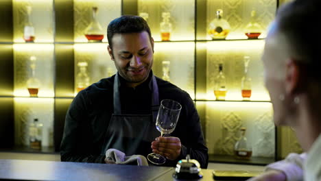 bartender talking with clients