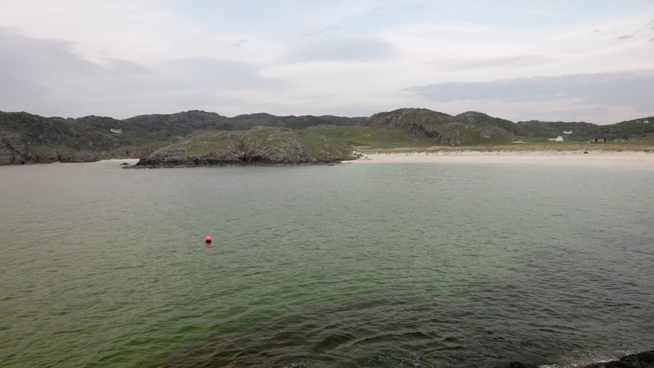 Statiuc shot of waves rolling into the beautiful Achmelvich Bay in the Highlands
